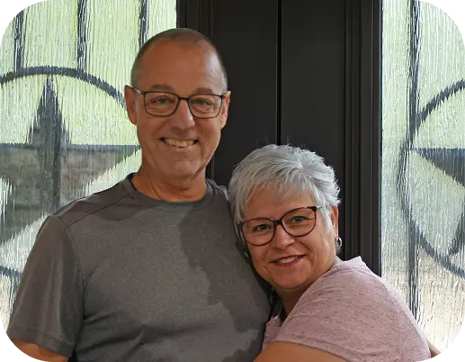 man and wife hugging